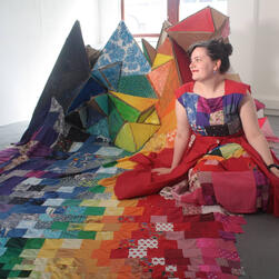 Multicoloured cardboard and fabric standing sculpture